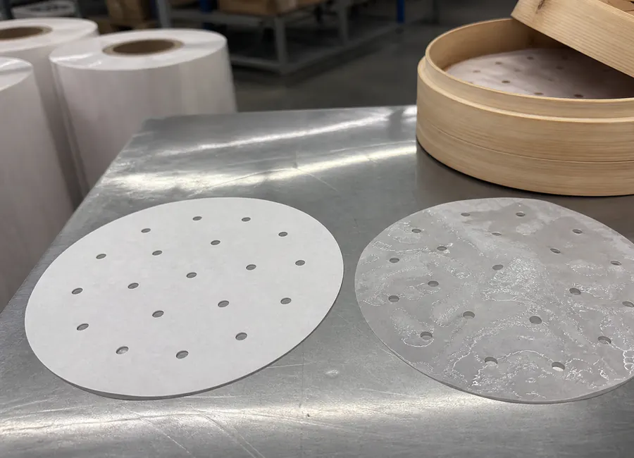 perforated round or square steaming paper used under moist heated food sample comparison