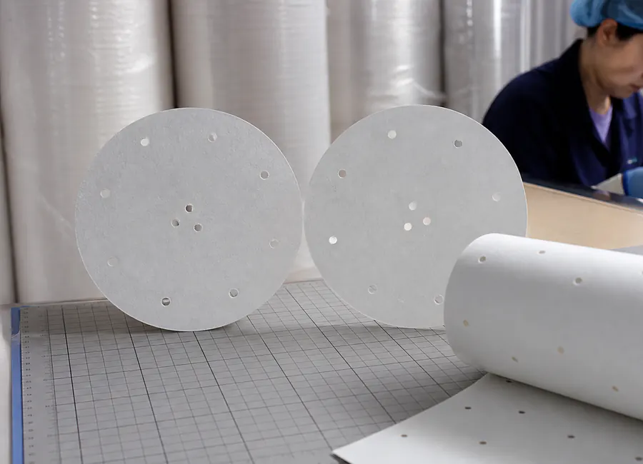 custom perforated steaming-paper sheets and liners sample comparison