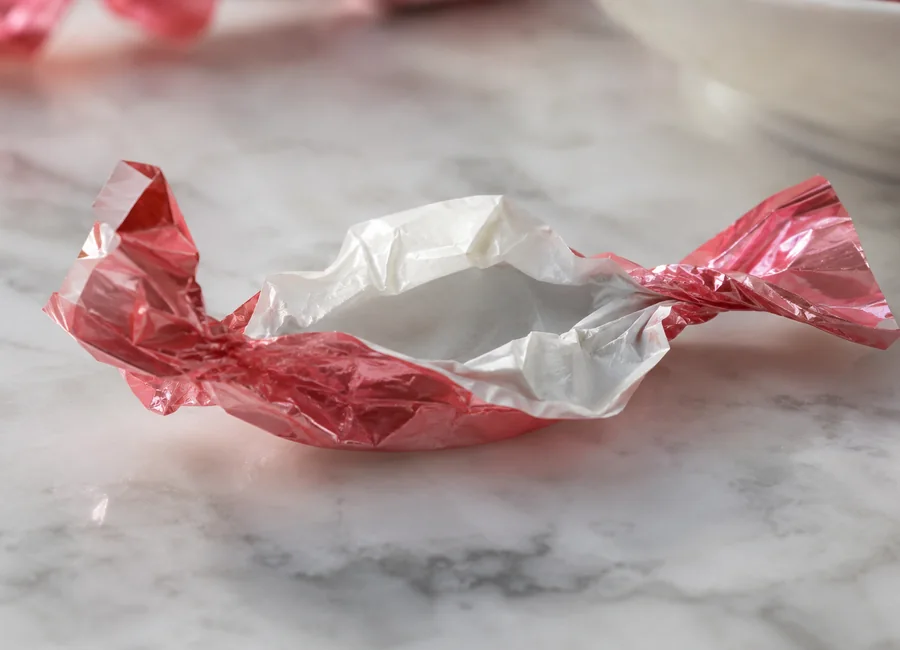 Thin candy wrapping paper with folds and delicate gloss